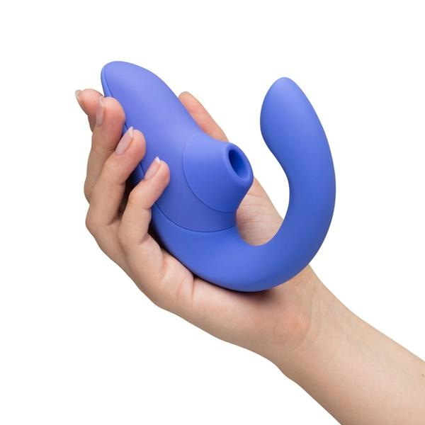 Womanizer Blend Air Rabbit Vibrator with hand holding