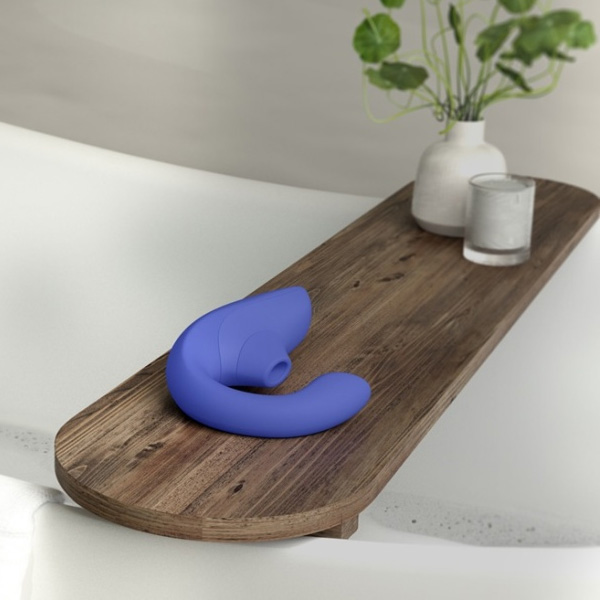 Womanizer Blend Air Rabbit Vibrator in a bath room